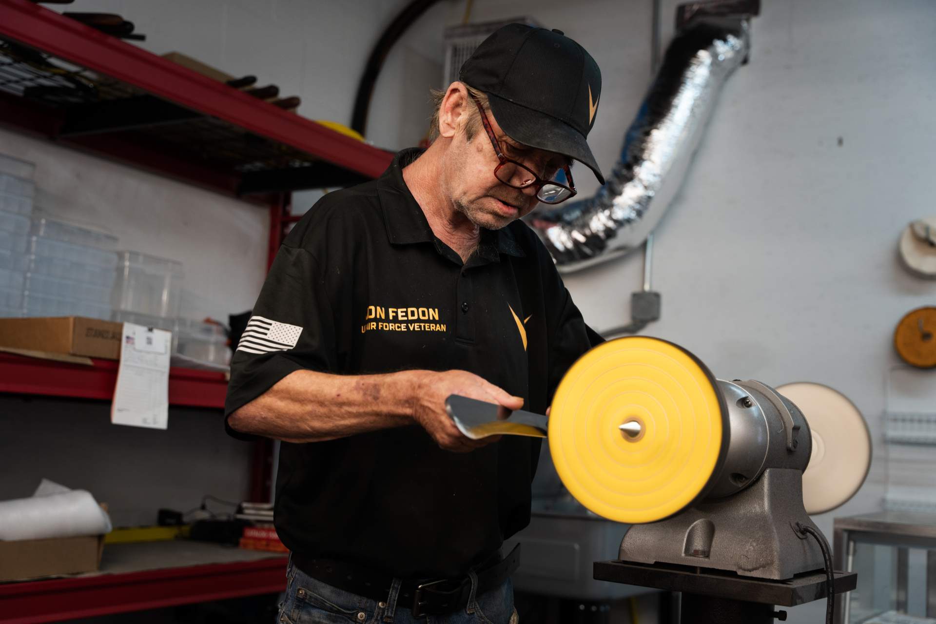 Gentleman sharpening an axe