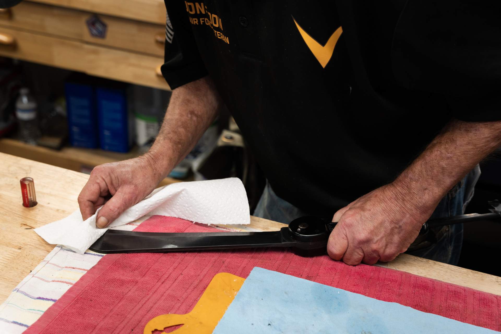 Man polishing a machete